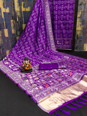 Purple flowy dola silk saree with patola woven design border & lagdi patta pallu