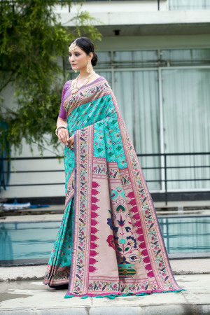 Sea green color patola silk saree with zari weaving work