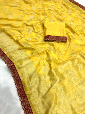 Yellow color viscose georgette with lace border zari design saree