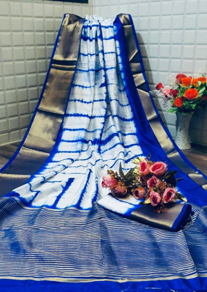 Blue color tassar silk saree with woven border