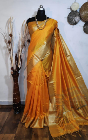 Yellow color aasam silk saree with zari weaving work