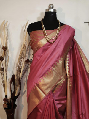 Pink color aasam silk saree with zari weaving work