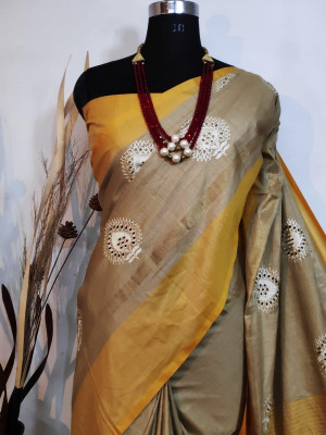 Yellow color Jute silk embroidered cut work Saree