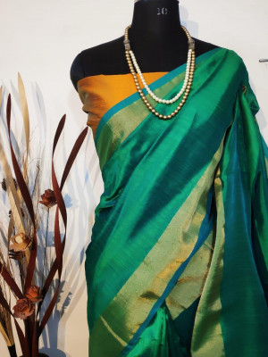 Rama green color soft raw silk Zari Woven border Work Saree