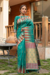 Rama green color pure tussar silk saree with ikkat woven border