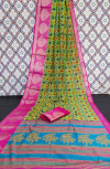 Green and rani pink color soft cotton saree with printed work