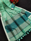 Sea green color metallic linen silk saree with zari work