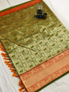 Green color Kanjivaram silk jacquard saree with golden zari weaving work