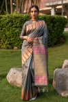 Gray color pure tussar silk saree with ikkat woven border