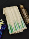Beige color tussar silk weaving saree with ikat woven border