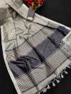 Gray color metallic linen silk saree with zari work