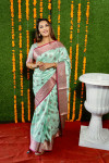 Sea green color soft linen silk saree with weaving work