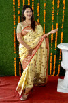 Yellow color kanchi silk saree with zari work