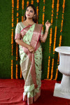 Pista green color soft linen silk saree with weaving work