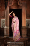 Pink color pure linen saree with zari woven border and pallu