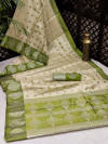 Mehndi green color art silk saree with satin woven border