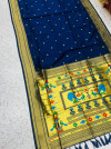 Navy blue color paithani silk saree with zari woven work
