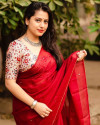 Red color dola silk saree with mirror work & aari brorder