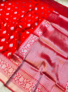 Red color soft kanchipuram silk saree with silver zari weaving work