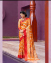 Orange color soft silk saree with weaving work