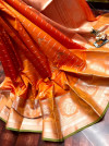 Orange color jacquard silk saree with zari work
