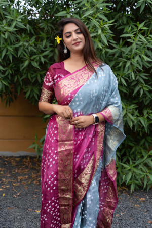 Gray and Magenta color bandhej silk saree with zari weaving work