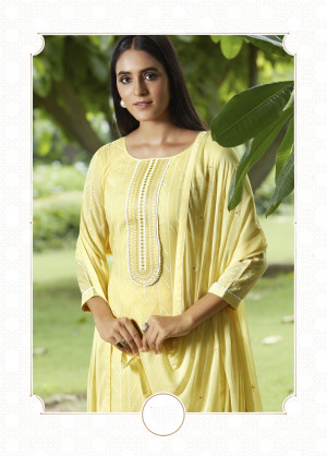 Yellow color cotton with sequence embroidered work dress material