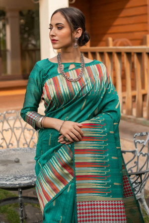 Rama green color pure tussar silk saree with ikkat woven border