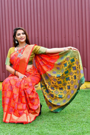 Red color patola silk saree with weaving work