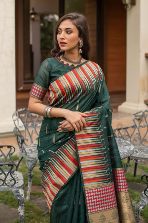 Green color pure tussar silk saree with ikat woven border