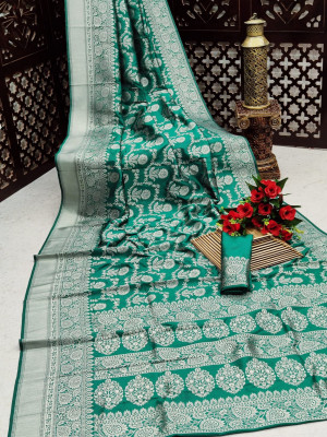 Rama green color banarasi silk saree with silver zari weaving work