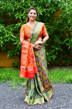 Green color patola silk saree with weaving work