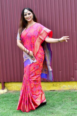 Pink color patola silk saree with weaving work