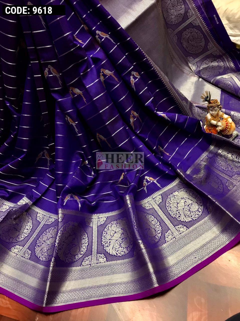 Purple color jacquard silk saree with zari work