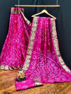 Pink color pure hand bandhej bandhani saree with zari weaving work