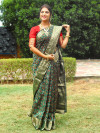 Dark green color patola silk saree with zari weaving work