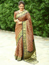Black color patola silk saree with zari weaving work
