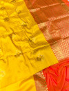 Yellow color rich banarasi silk saree with zari weaving work