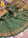 Dark green color soft fancy silk saree with golden zari weaving work