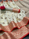 Off white color linen silk saree with zari work