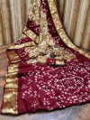 Brown and maroon color hand bandhej bandhani silk saree with zari weaving work
