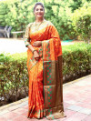 Orange color soft banarsi silk saree with zari weaving work