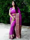 Magenta color soft hand bandhej banhdani saree with zari weaving work