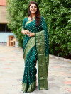 Green color soft hand bandhej bandhani saree with zari weaving work