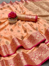 Peach color linen silk saree with zari work