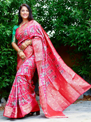 Rani pink color patola silk saree with zari weaving work