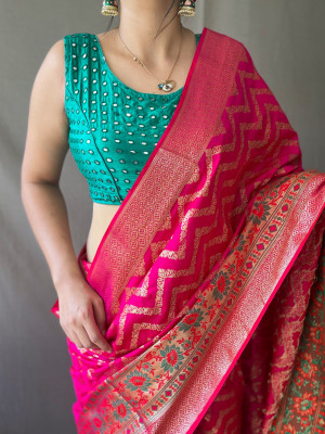 Rani pink color pure silk saree with zari weaving work