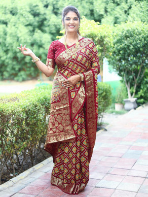 Maroon color patola silk saree zari withweaving work