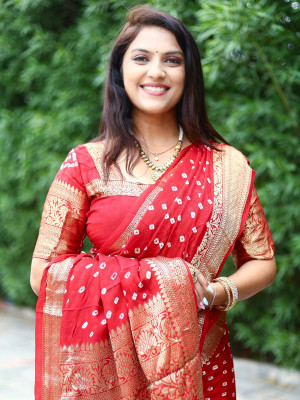 Red color soft hand bandhej bandhani saree with zari weaving work