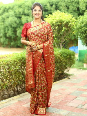 Red color soft patola silk saree with zari weaving work